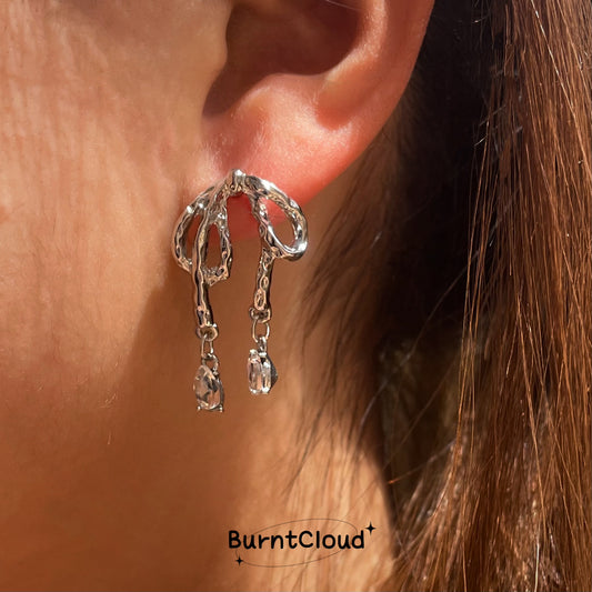 E33 Upset Bowknot Zirconia Silver Earrings