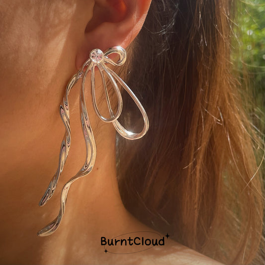 E37 Exaggerated Bowknot Silver Earrings